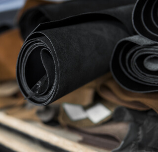 Black suede material for sealing and cushioning applications